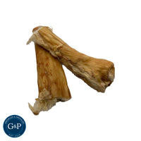 Natural rabbit skin dog chew with fur, perfect for chewing and dental health.